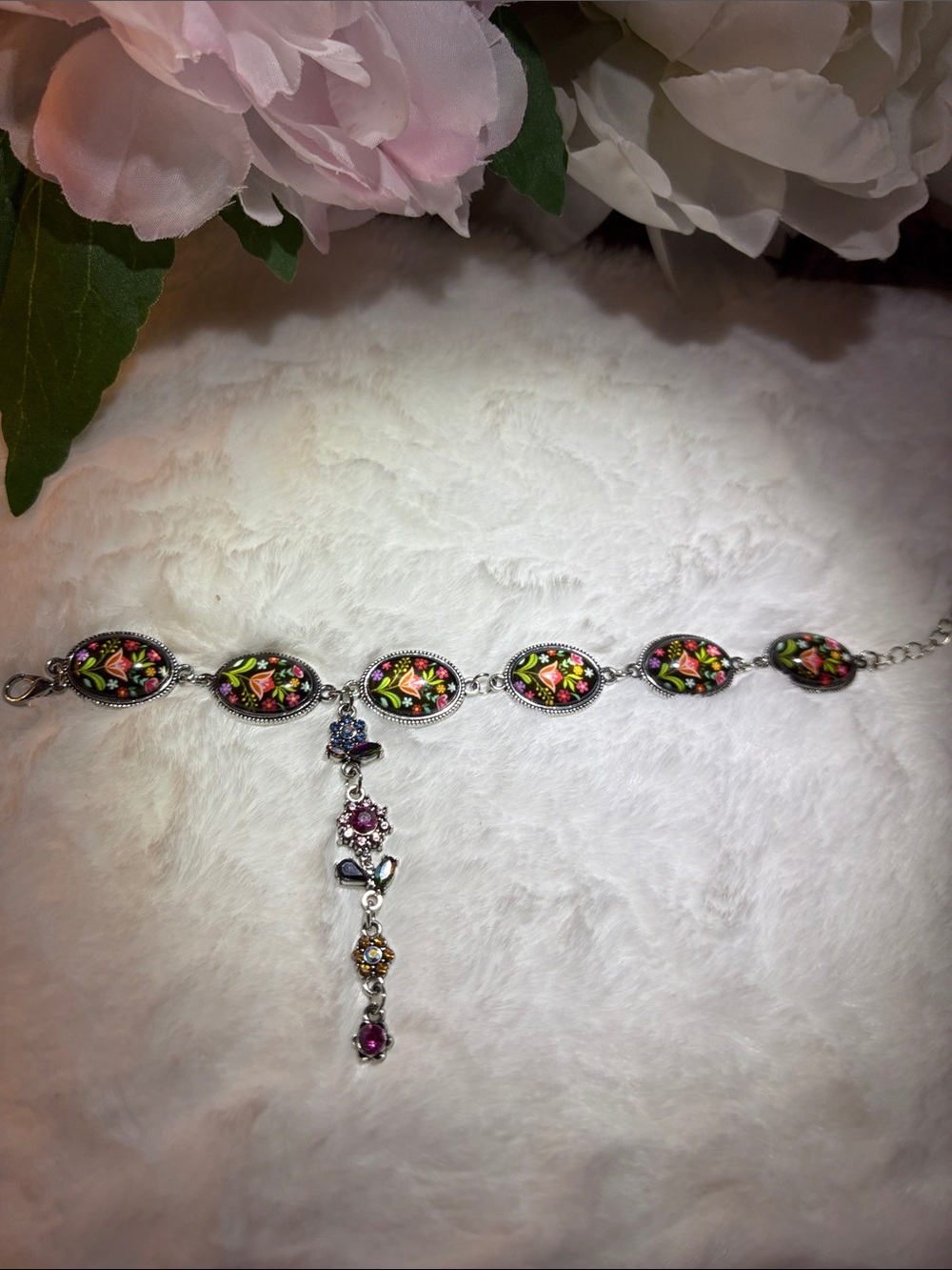 Delicate FloralBracelet with Dangle Accent of Austrian crystal flowers.